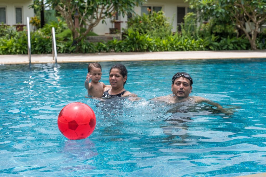 Tarik, Mansi and Zavian in the pool in OYO Premium Colva Betalba